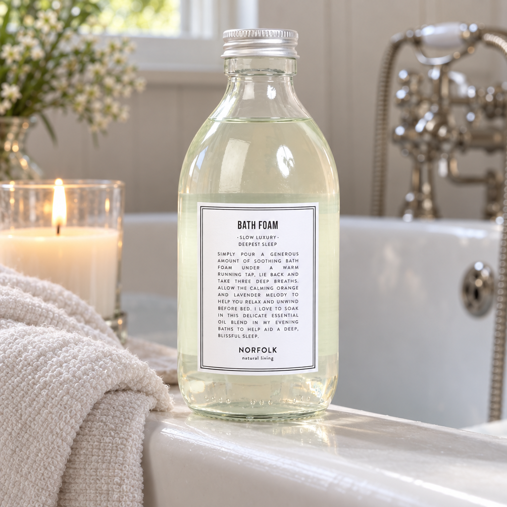 Norfolk Natural Living Deepest Sleep Bath Foam on the edge of a bath