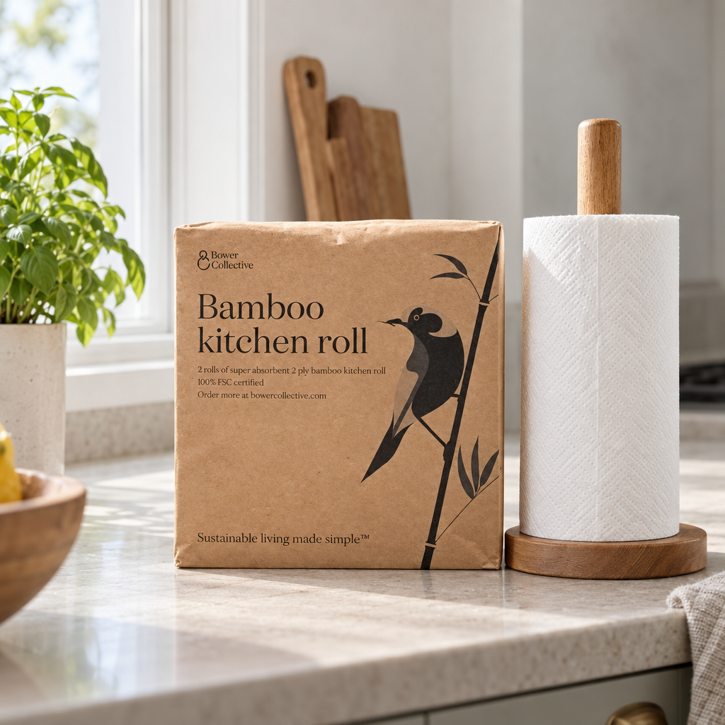 Bower Collective bamboo kitchen roll pack beside a roll on a wooden holder
