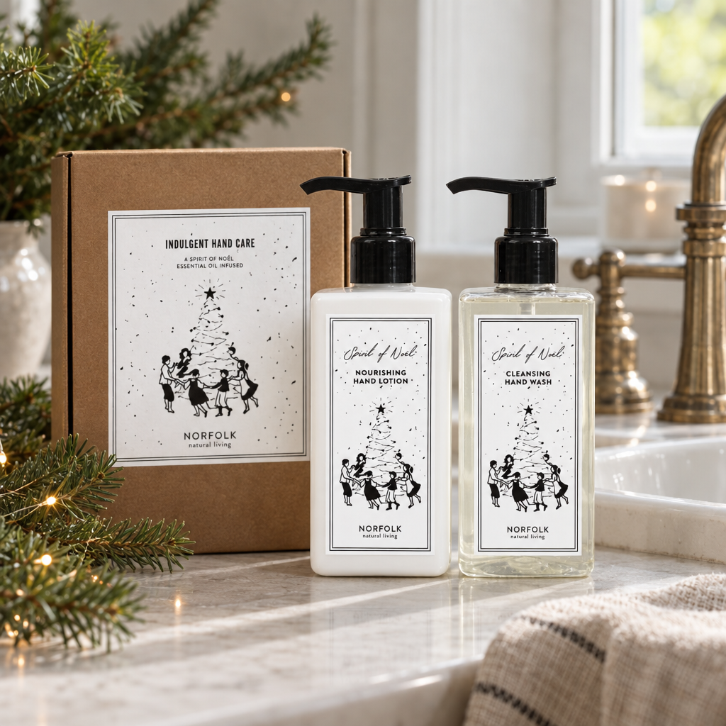 Norfolk Natural Living Spirit of Noel hand lotion and hand wash set by a sink
