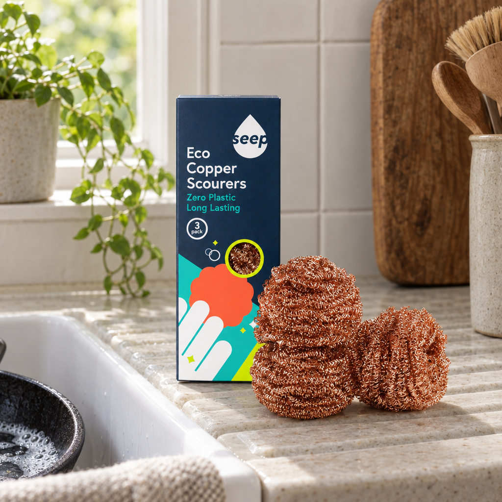 Seep Eco Copper Scourers pack beside a butler sink