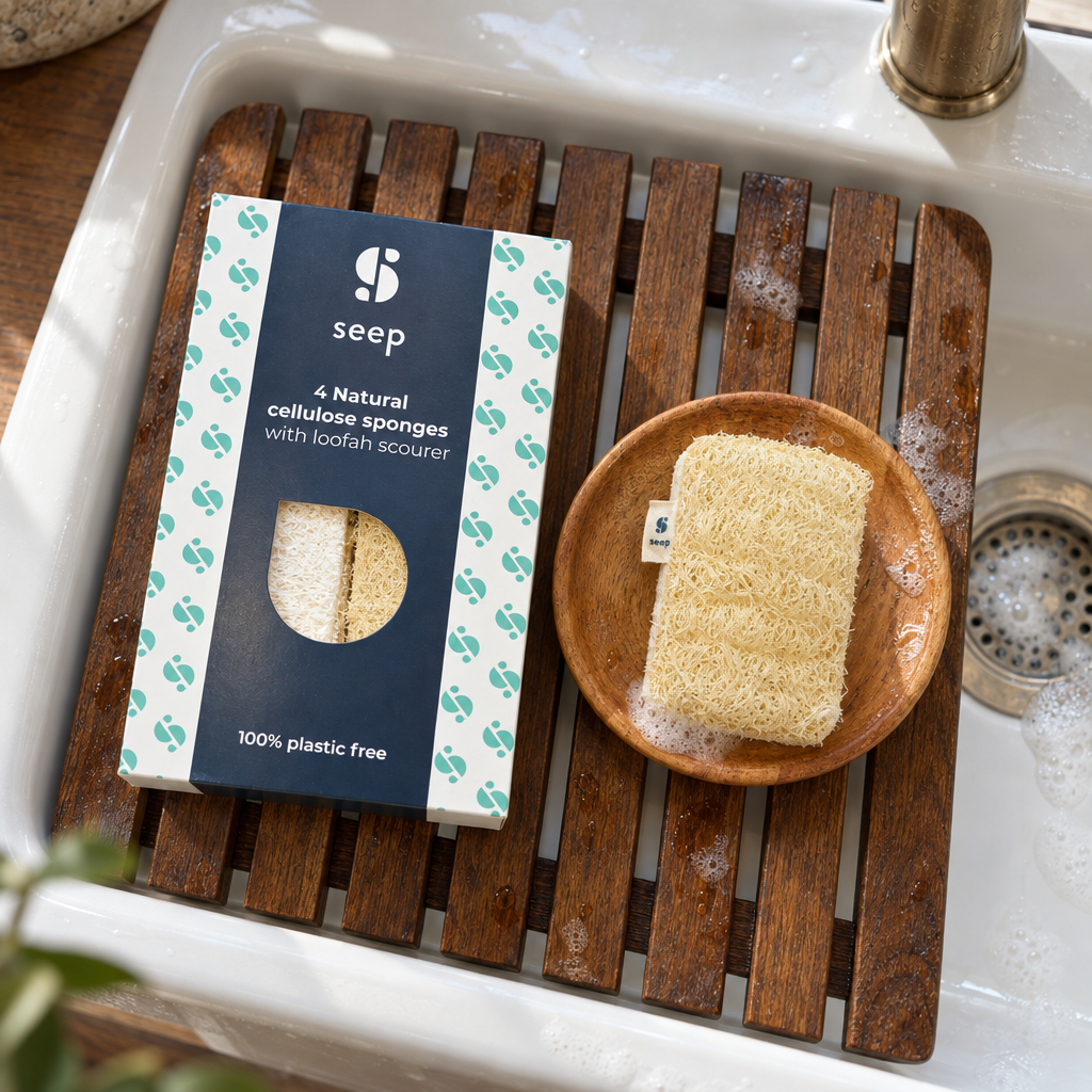 Seep natural cellulose sponges with loofah scourer on a sink rack