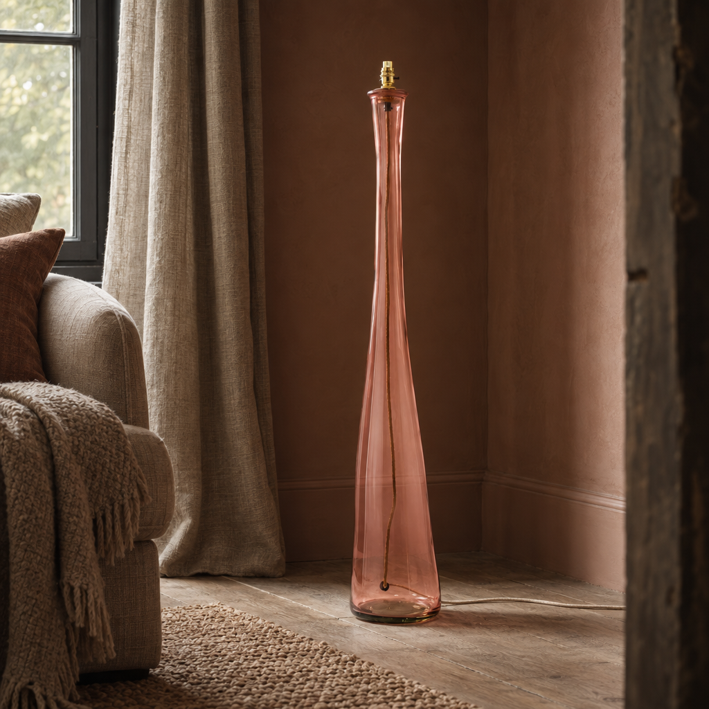 Pink Jarron blown glass floor lamp in a sitting room corner