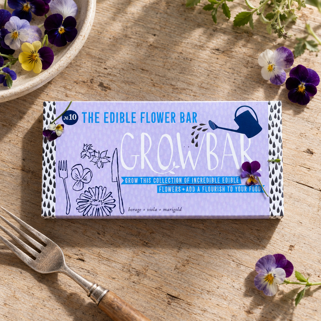 The Edible Flower Bar Growbar No.10 on an oak table with violas